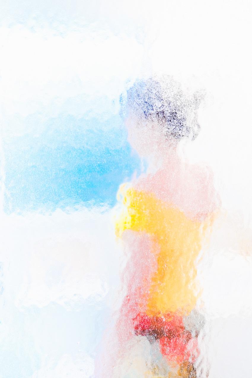 Girl Standing by the Sea